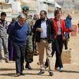 United Nations Secretary General Antonio Guterres (C) walks during a visit to the Zaatari refugee camp which shelters some 80,000 Syrian refugees on the Jordanian border with war-ravaged Syria on March 28, 2017