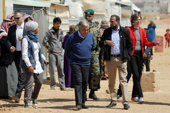 United Nations Secretary General Antonio Guterres (C) walks during a visit to the Zaatari refugee camp which shelters some 80,000 Syrian refugees on the Jordanian border with war-ravaged Syria on March 28, 2017