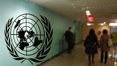 The United Nations logo is displayed on a door at U.N. headquarters in New York February 26, 2011. REUTERS/ Joshua Lott