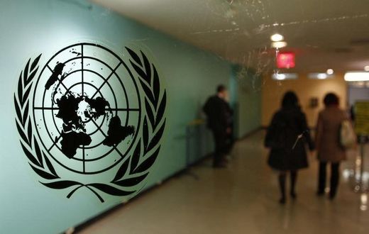 The United Nations logo is displayed on a door at U.N. headquarters in New York February 26, 2011. REUTERS/ Joshua Lott