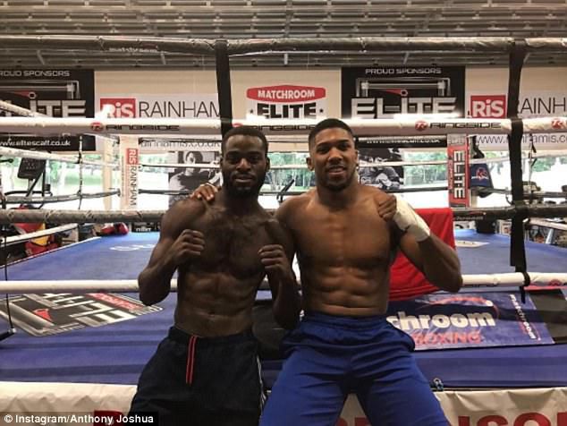 ___6892252___https:______static.pulse.com.gh___webservice___escenic___binary___6892252___2017___6___24___12___41B18DE100000578-4634382-World_heavyweight_champion_Anthony_Joshua_poses_in_the_gym_with_-a-34_1498258187605_1