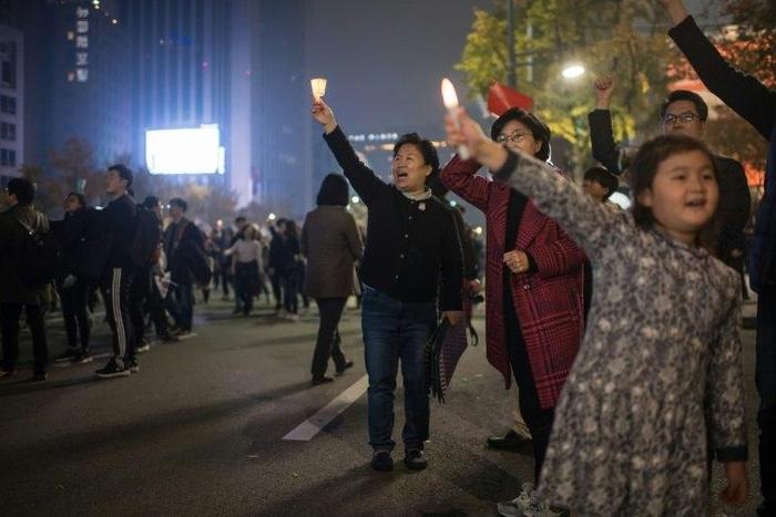 Demonstrators gather during a protest calling for the resignation of South Korean President Park Geun-Hye, at Gwanghwamun square in Seoul, on November 5, 2016