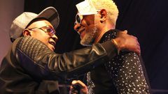 Steve Mbogo Gives Awilo some money