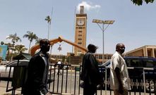 Citizens walking outside Parliament buildings