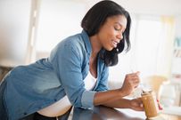 pregnant-woman-eating-peanut-butter Payment (Parents Magazine)