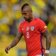 Chile's Arturo Vidal reacts at the Russia 2018 World Cup football qualifier match against Ecuador in Quito, on October 6, 2016