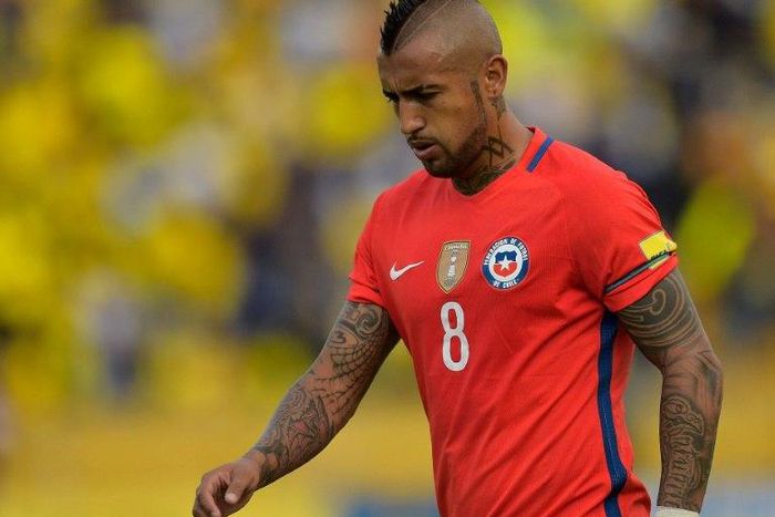Chile's Arturo Vidal reacts at the Russia 2018 World Cup football qualifier match against Ecuador in Quito, on October 6, 2016