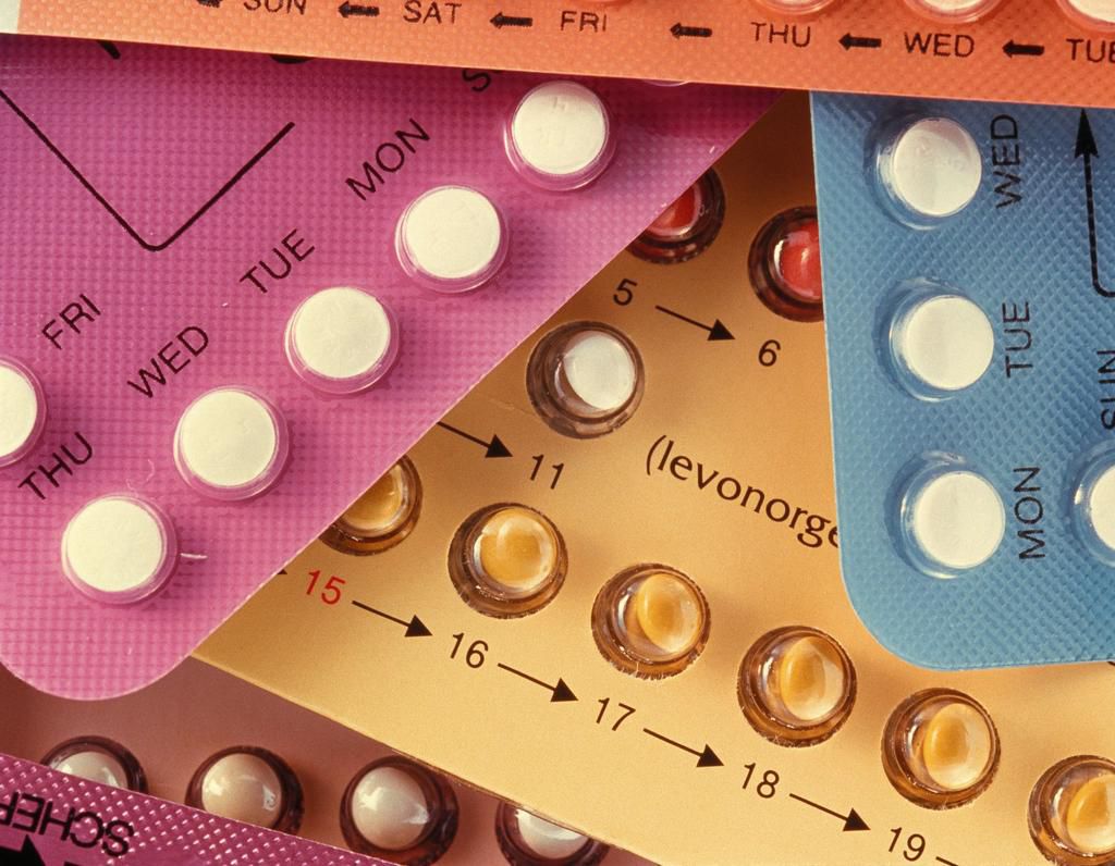 Assorted contraceptive pills in their packaging