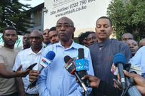 Independent pathologist Dr Peter Ndegwa speaks to members of the press