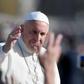 Pope Francis greets the crowd from the popemobile after a mass marking the end of the Vatican's jubilee year on November 20, 2016