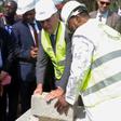 Guinean President Alpha Conde (R) and French Foreign Minister Jean-Marc Ayrauit (C) put the first stone of the upcoming Pasteur Institute in Conakry on November 11, 2016