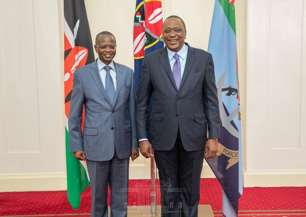 Former IG Joseph Boinnet with President Uhuru Kenyatta