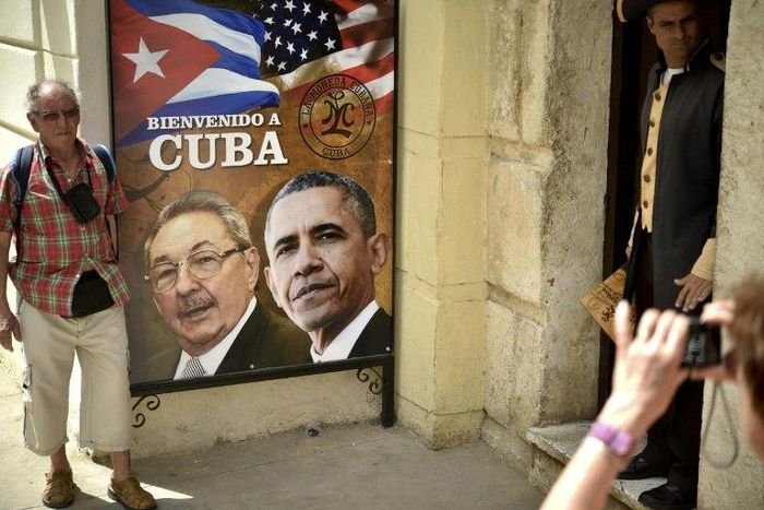 A poster in Havana shows Cuban and US Presidents Raul Castro and Barack Obama, who in December 2014 announced simultaneously their nations would normalize relations