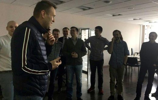 This handout picture obtained on April 10, from Leonid Volkov's Twitter account shows Alexei Navalny speaking with employees at the offices of his anti-corruption foundation in Moscow