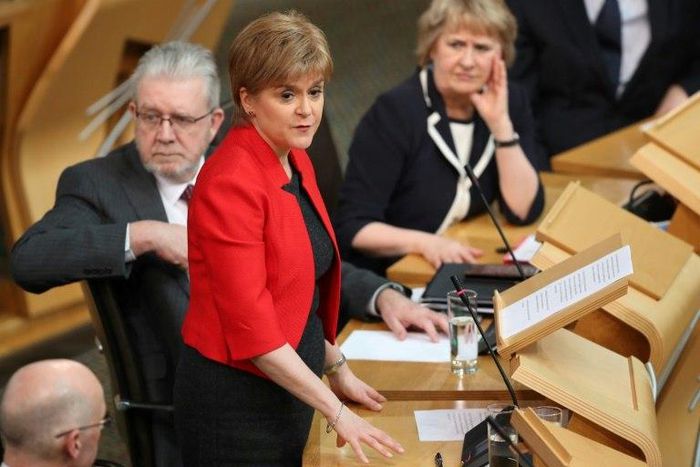 Scotland's lawmakers are due to back First Minister Nicola Sturgeon's (C) call for a second independence referendum when they vote in Edinburgh