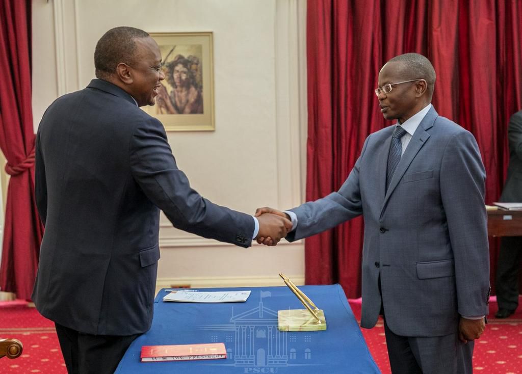 Former IG Joseph Boinnet with President Uhuru Kenyatta