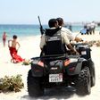 Tunisian security forces patrol a beach in Sousse, south of Tunisia's capital Tunis, on July 1, 2015, following the previous week's massacre at the resort there by a jihadist gunman