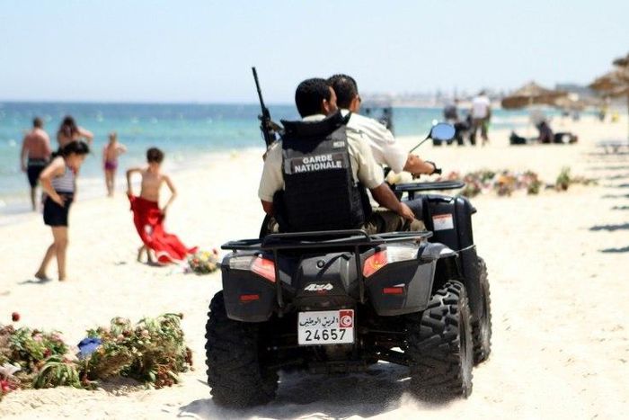 Tunisian security forces patrol a beach in Sousse, south of Tunisia's capital Tunis, on July 1, 2015, following the previous week's massacre at the resort there by a jihadist gunman