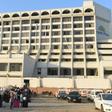 Guests gather outside Regent Plaza Hotel in Karachi, following a pre-dawn fire, on December 5, 2016
