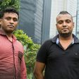 Sri Lankan refugees Ajith Puspa (left) and Supun Thilina Kellapatha pose for a photo in Hong Kong, on February 23, 2017