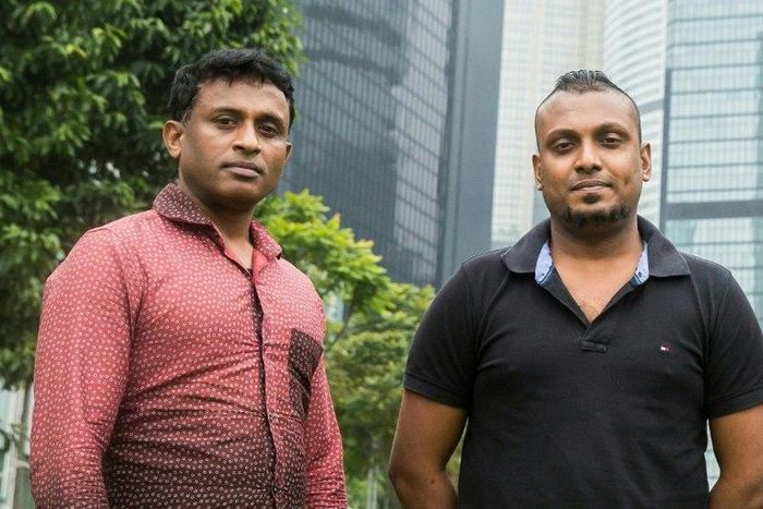 Sri Lankan refugees Ajith Puspa (left) and Supun Thilina Kellapatha pose for a photo in Hong Kong, on February 23, 2017