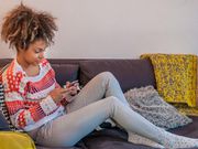 Woman texting on the phone (Courtesy)