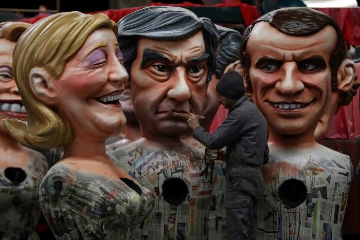 Sparring images: French presidential candidates (from left) Marine Le Pen, Francois Fillon and Emmanuel Macron will be seeking to paint themselves as leadership material in their first TV debate on Monday