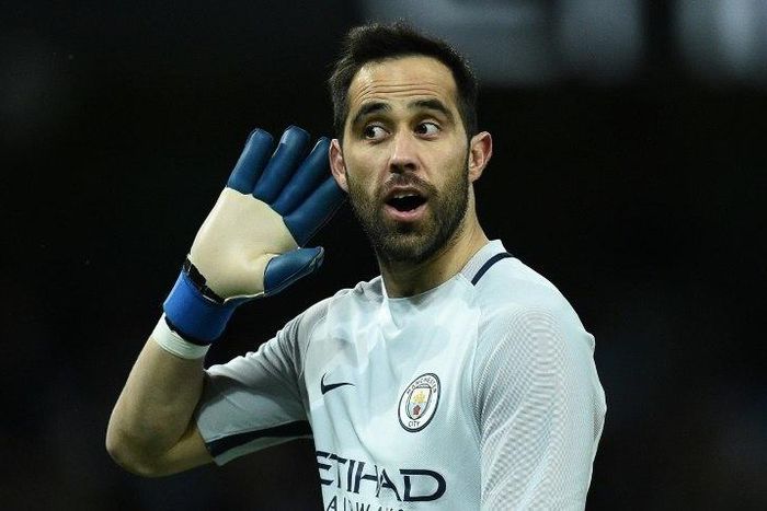 Manchester City's Chilean goalkeeper Claudio Bravo gestures to Huddersfield fans after Manchester City scores their fifth goal on March 1, 2017
