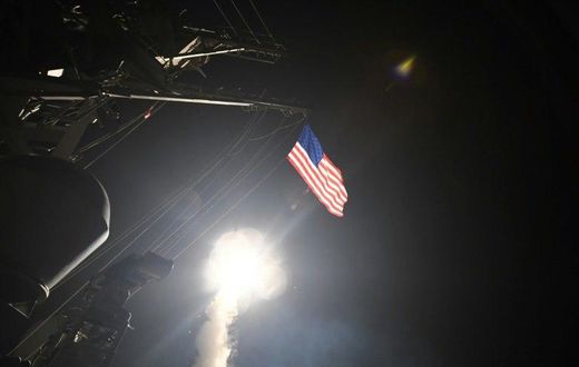 The guided-missile destroyer USS Porter launches Tomahawk missiles during military operations in the Mediterranean Sea, April 7, 2017