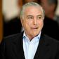 Brazilian President Michel Temer arrives to offer a press conference at Planalto Palace in Brasilia, on November 27, 2016
