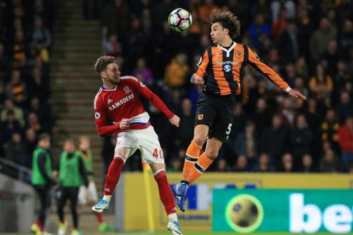 Middlesbrough's defender James Husband (L) vies with Hull City's midfielder Lazar Marković during an English Premier League football match at the KCOM Stadium in Kingston upon Hull, north east England on April 5, 2017