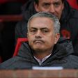 Manchester United's Portuguese manager Jose Mourinho sits in the dugout before the UEFA Europa League quarter-final match between Manchester United and Anderlecht at Old Trafford in Manchester, north west England, on April 20, 2017