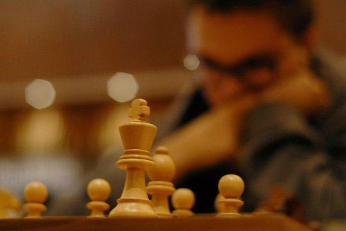 The Malaysian Chess Federation said it would investigate after the exclusion of the young player over her clothing prompted a public backlash