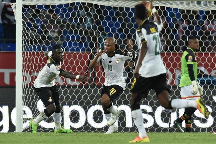 Ghana's forward Andre Ayew (C) celebrates with teammates after scoring his team's second goal during the 2017 Africa Cup of Nations quarter-final football match between DR Congo and Ghana in Oyem on January 29, 2017