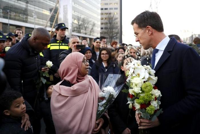 Thousands of mourners including Dutch Prime Minister Mark Rutte took to Utrecht's streets to pay their last respects to the victims of the deadly rampage