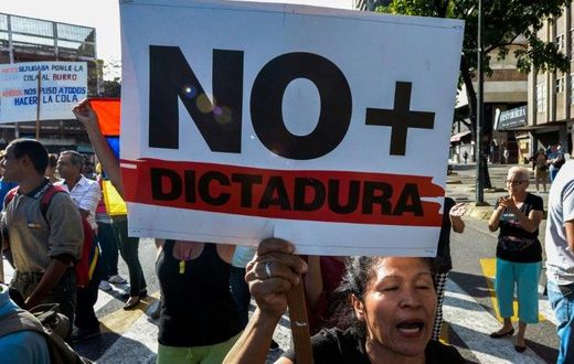 A Venezuelan activist chants slogans against President Nicolas Maduro during an opposition rally in Caracas, on March 31, 2017