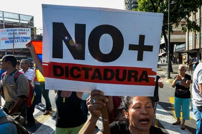 A Venezuelan activist chants slogans against President Nicolas Maduro during an opposition rally in Caracas, on March 31, 2017