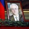 Flowers are laid in front of a portrait of Russia's Ambassador to the United Nations Vitaly Churkin at the Foreign Ministry guest house in Moscow on February 21, 2017