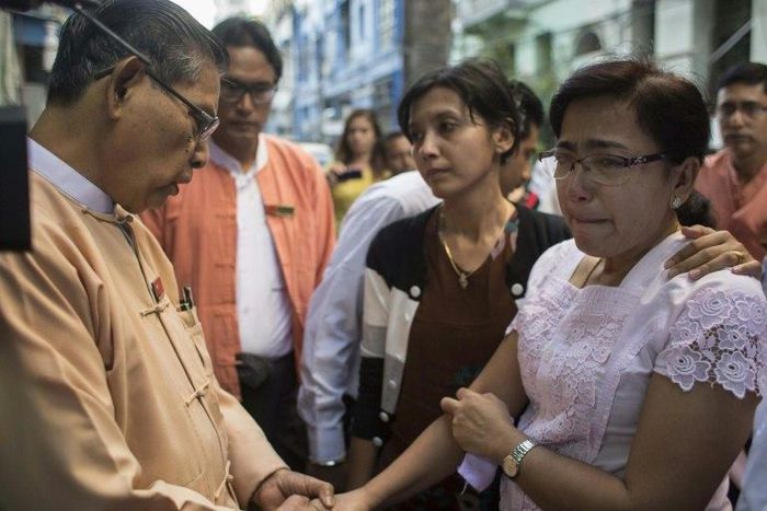 Tin Tin Aye (right), the widow of murdered Muslim lawyer Ko Ni, is comforted by Tin Oo of the ruling National League for Democracy party in Yangon on January 30, 2017