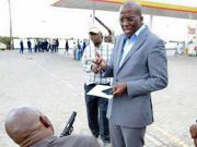 Paul Njoroge with Polycarp Igathe during the 2017 gun incident