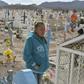 Maria Guadalupe Guereca visits the grave of her murdered son Sergio Hernandez in Ciudad Juarez, Chihuahua, Mexico
