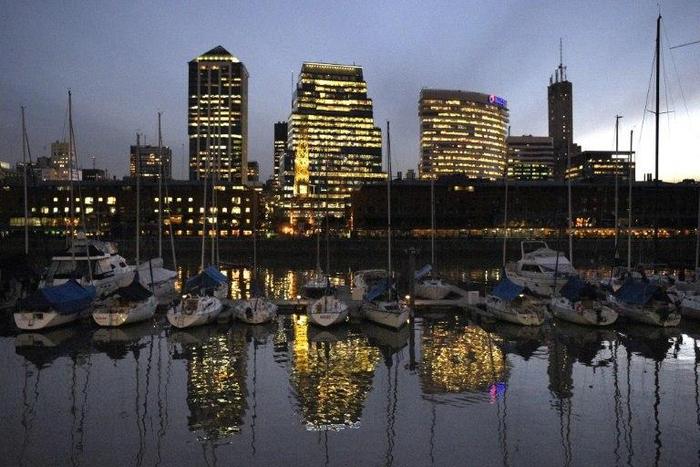 YY Development Group, a partner in Trump's real estate empire, is planning to build a 35-floor office building in central Buenos Aires, sources in the company said
