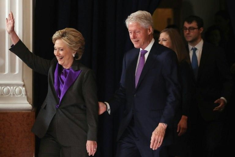 Former Secretary of State Hillary Clinton, accompanied by her husband former President Bill Clinton, takes the stage to concede the presidential election at the New Yorker Hotel on November 9, 2016 in New York City