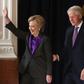 Former Secretary of State Hillary Clinton, accompanied by her husband former President Bill Clinton, takes the stage to concede the presidential election at the New Yorker Hotel on November 9, 2016 in New York City