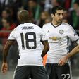 Manchester's United's Henrikh Mkhitaryan (C) celebrates with teammates after scoring a goal during their Europa League match against Saint-Etienne on February 22, 2017