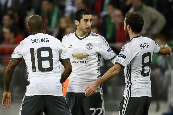 Manchester's United's Henrikh Mkhitaryan (C) celebrates with teammates after scoring a goal during their Europa League match against Saint-Etienne on February 22, 2017