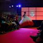 A model wears a creation by designer Micaela Oliveira during a presentation by Portuguese football club Benfica of 24 wedding dresses, 12 evening dresses and four dresses for girls at the Stadium of Light in Lisbon
