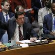 Russian Deputy Permanent Representative to the United Nations Vladimir Safronkov holds up his hand as he votes against a Draft resolution that condemns the reported use of chemical weapons in Syria at the Security Council on April 12, 2017