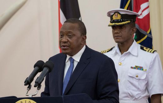 File image of former President Uhuru Kenyatta and his former Aide-de-Camp Major General Timothy Stelu Lekolool at State House Nairobi