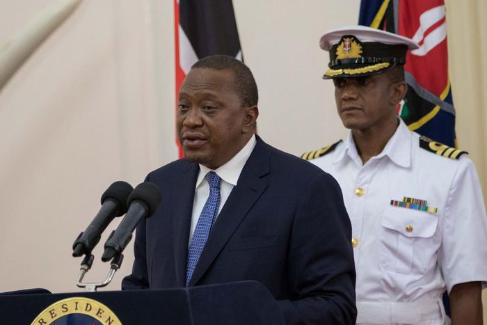 File image of President Uhuru Kenyatta and his  Aide-de-Camp Lieutenant Colonel Timothy Stelu Lekolool at State House Nairobi